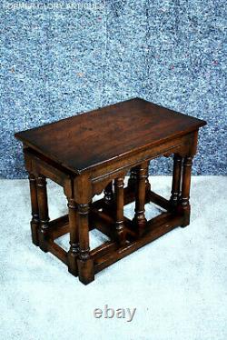 A Titchmarsh And Goodwin Style Oak Nest Of Three Coffee Tables Wine Lamp Stands