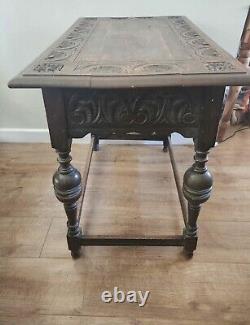 Antique 17th century Jacobean Carved centre hall refectory table. Solid dark oak