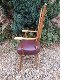 Chair. Carver, solid oak, leather upholstery. Excellent condition, mid century