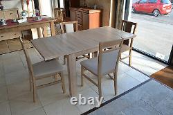 Extending dining table in light oak, dark oak and white colours, perfect size