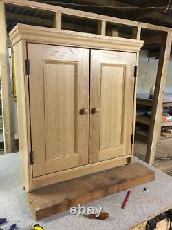 Handcrafted solid oak wall unit with cup hooks