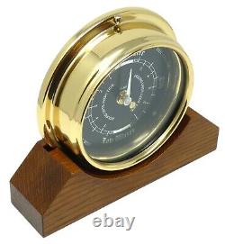 Prestige Tide Clock in Solid Brass and Black Dial, on a Dark Oak Mantle Mount