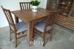 Set of extending dining table and 4 wooden chairs strong, solid, oak stirling Ma
