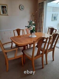 Solid Oak Extendable Dining Table and 6 Chairs including 2 Carvers