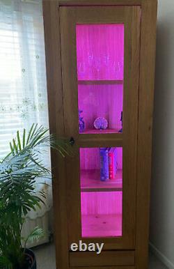 Solid oak glazed cabinet with LED strip light