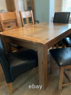 Solid oak rustic 4ft7 x 3ft extending dining table and 6 oak chairs