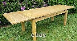 Used solid oak extending dining table