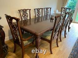 Used solid oak extending dining table and chairs