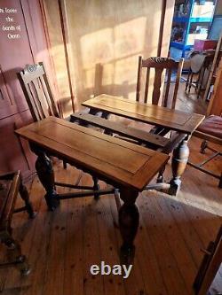 Vintage Art Nouveau draw leaf oak dining table with original matching chairs