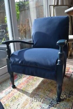 Vintage low armchair, deep blue, solid wood, reupholstered in faux nubuck suede