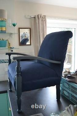 Vintage low armchair, deep blue, solid wood, reupholstered in faux nubuck suede
