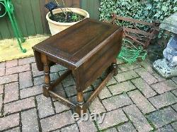 Vintage solid oak twist top drop leaf table on ring turned supports